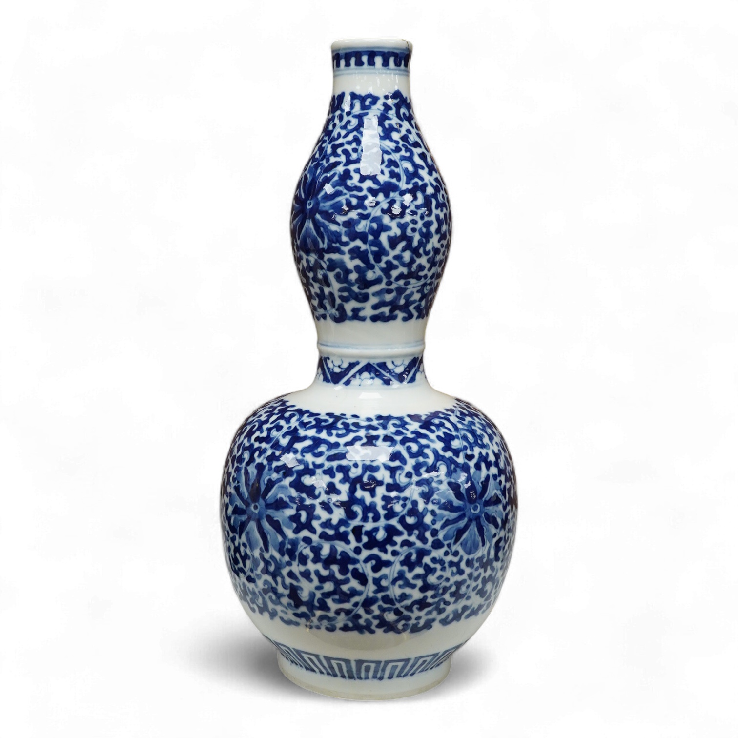 And early 20th century Chinese blue-and-white double gourd shaped vase, blue ring marks to the base, 29cm high